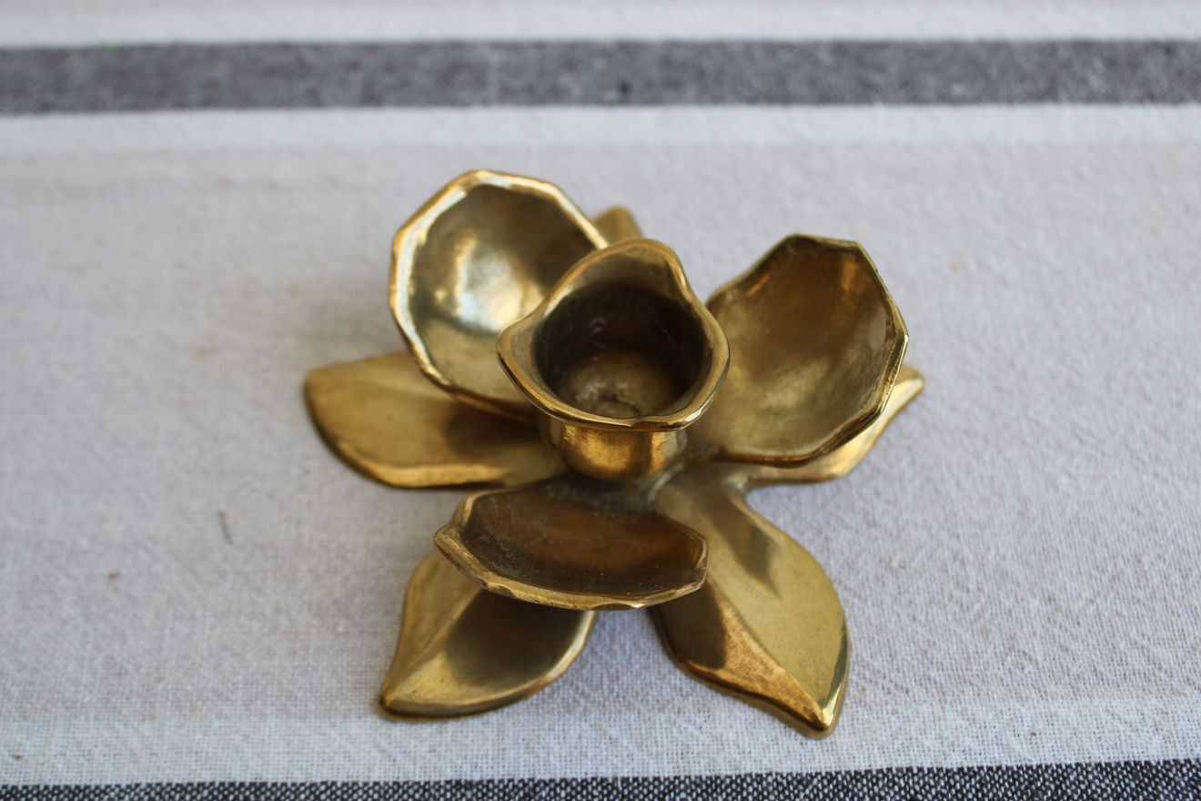 Golden brass candle holder