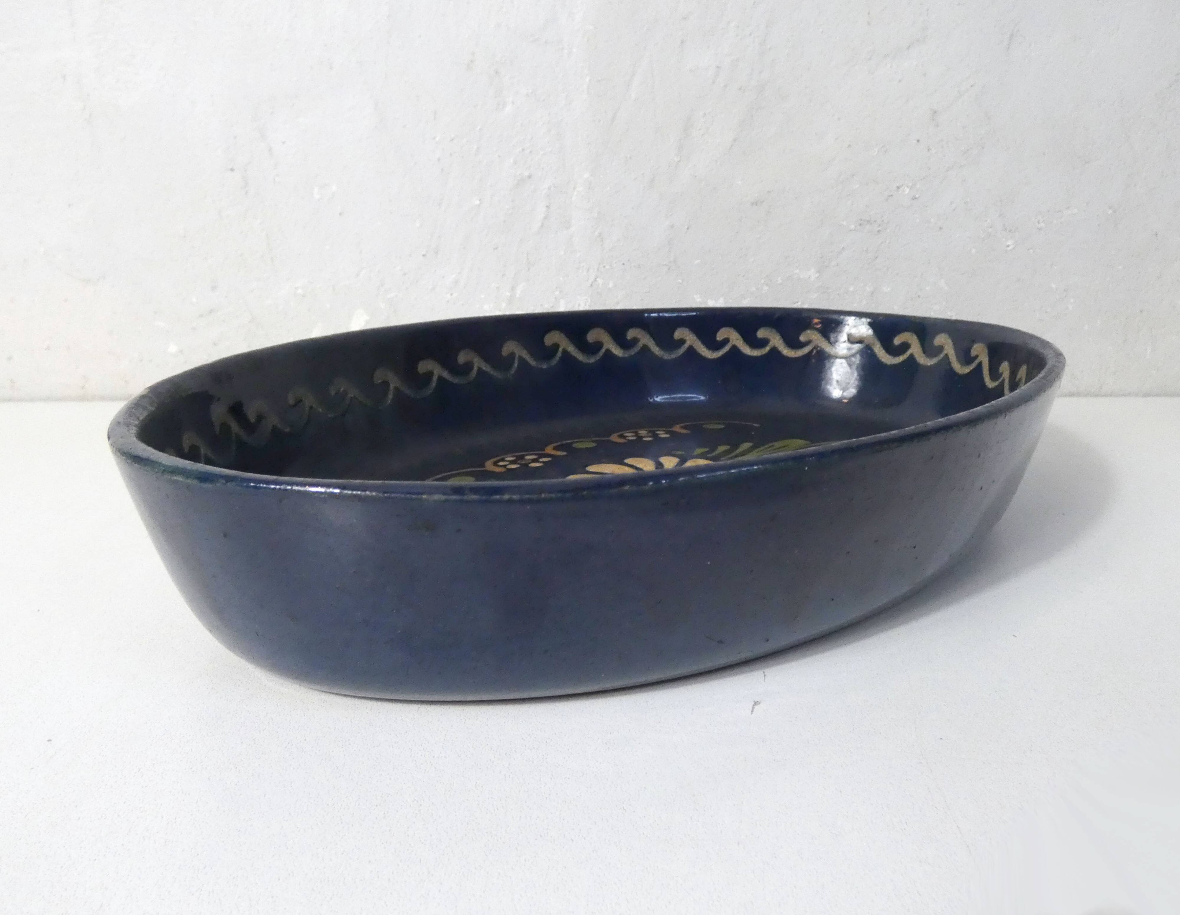 old glazed terracotta dish