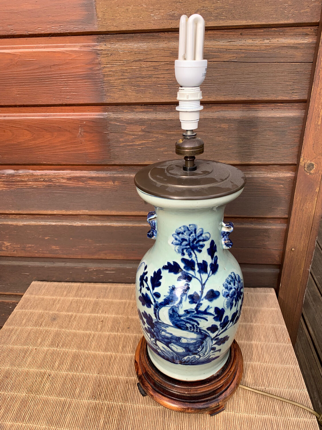 Celadon blue porcelain lamp with vegetal decoration, China, 19th century