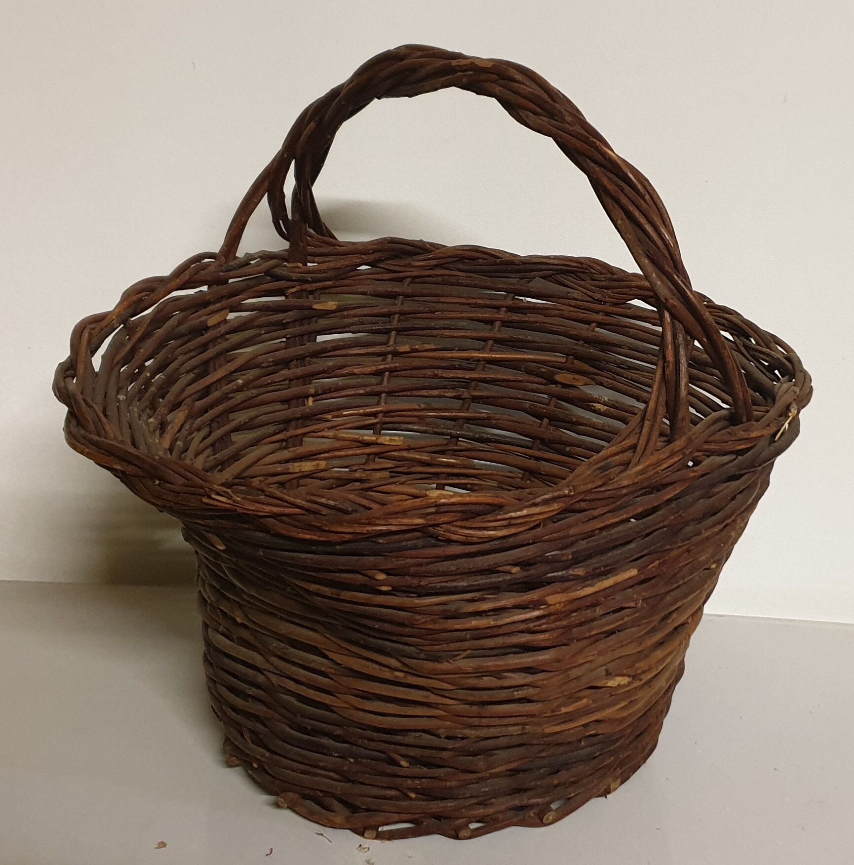 Rustic basket made of raw wicker