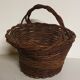 Rustic basket made of raw wicker