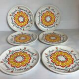 Six assiettes à fromages à fleurs vintage