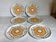 Six vintage floral cheese plates.