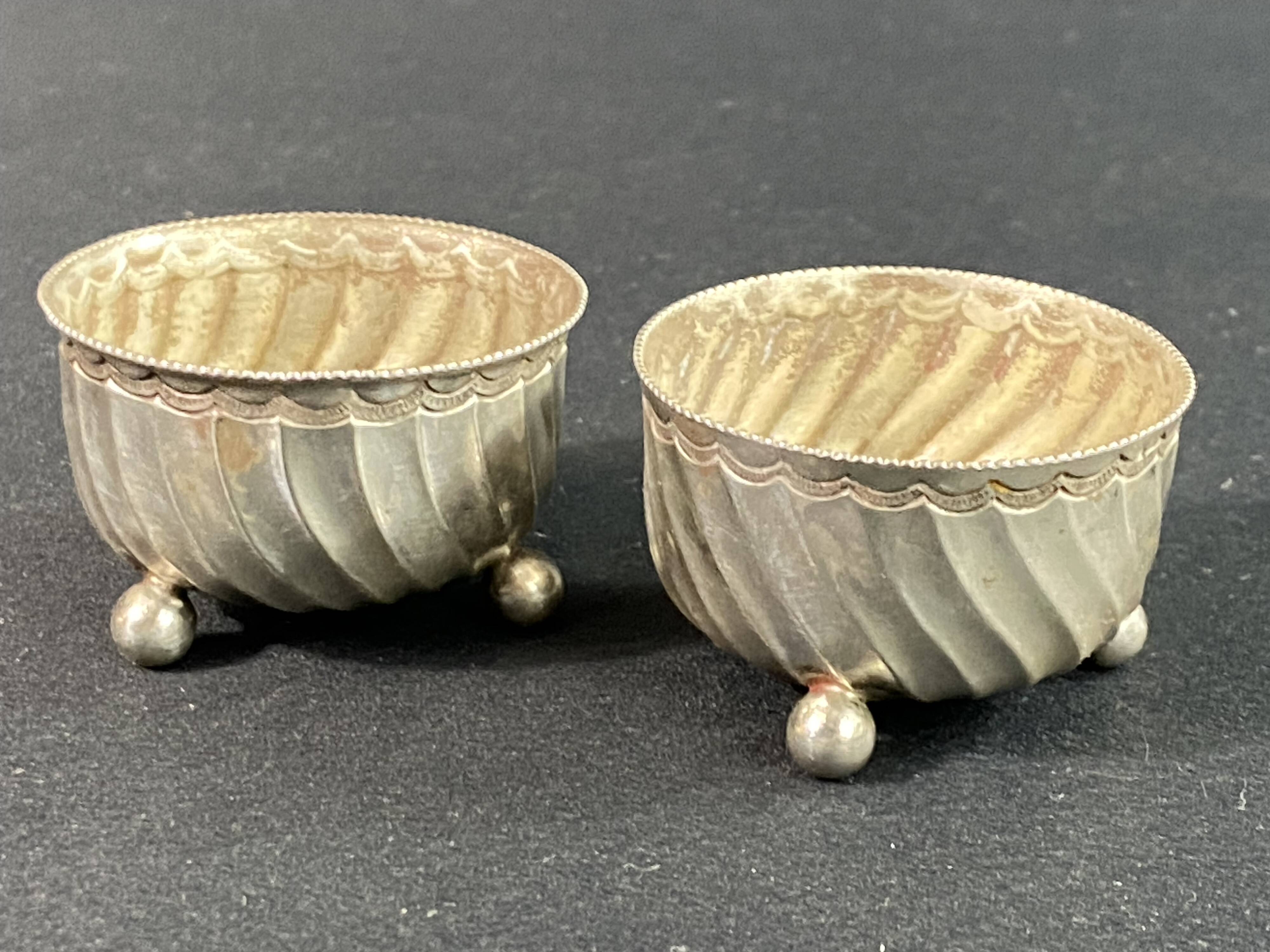 Pair of solid silver salt cellars with weevil hallmark