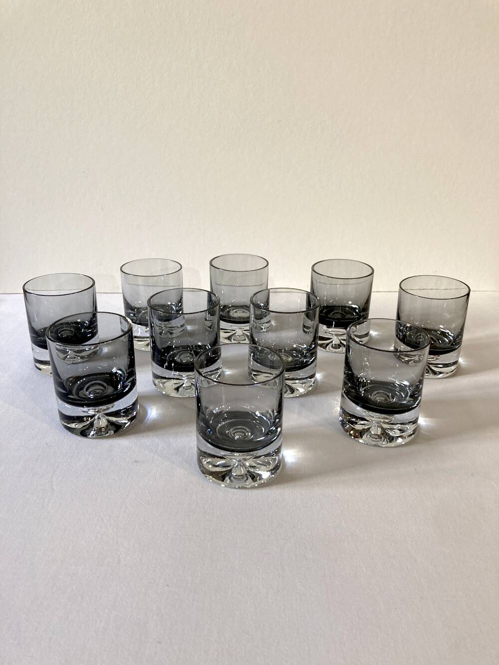 10 smoked glass aperitif glasses, 1960s-1970s