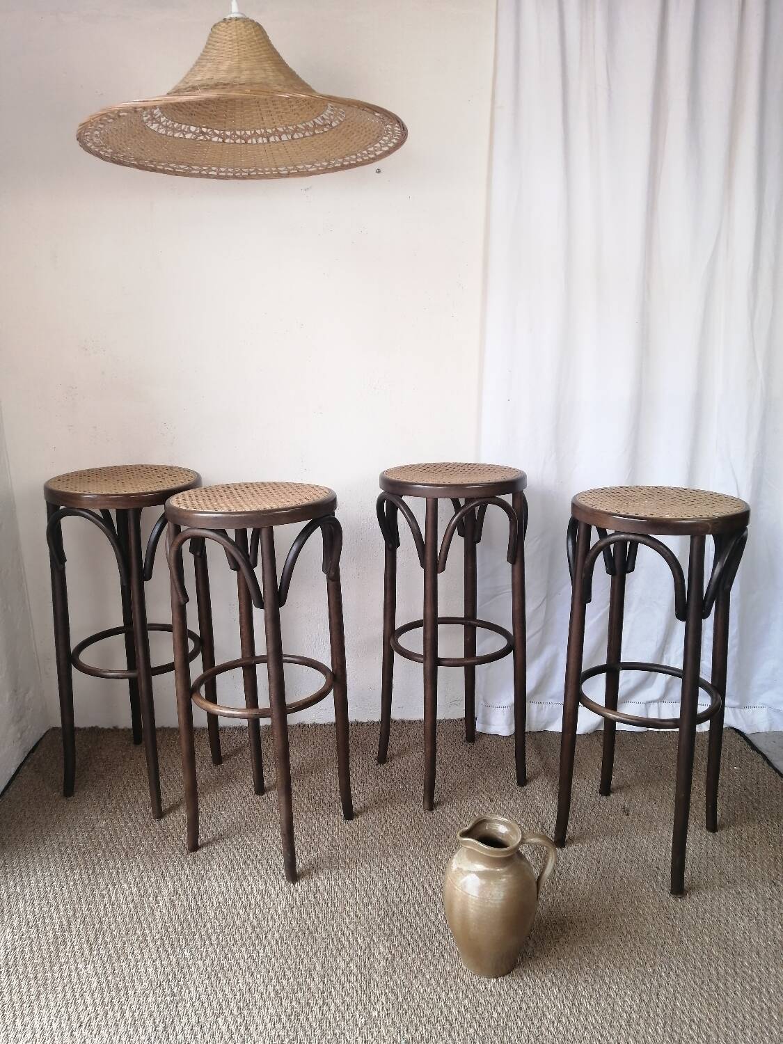 Set of 4 high bistro stools in curved wood and canework.
