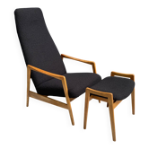Fauteuil à dossier haut avec repose-pieds en bouclé noir