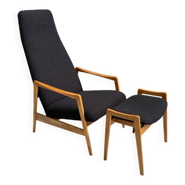 Fauteuil à dossier haut avec repose-pieds en bouclé noir