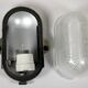 Glass and Bakelite wall light from the 1950s.