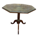 Tripod table with a sculpted top