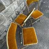 Three folding opera chairs in old gold velvet and brass structure