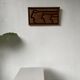 Bas relief cadre bois motifs visages