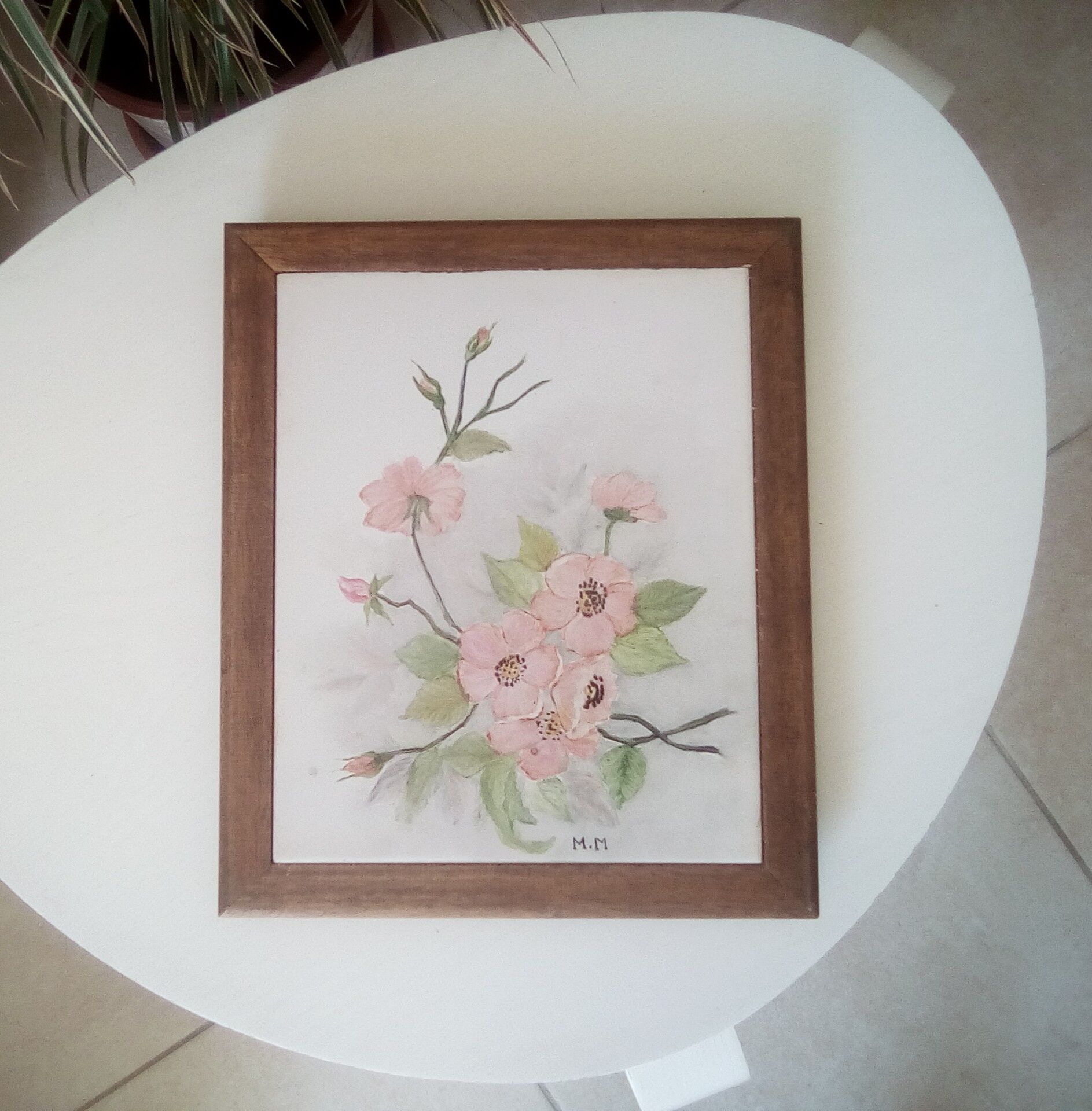 Underside of vintage wood and ceramic dish