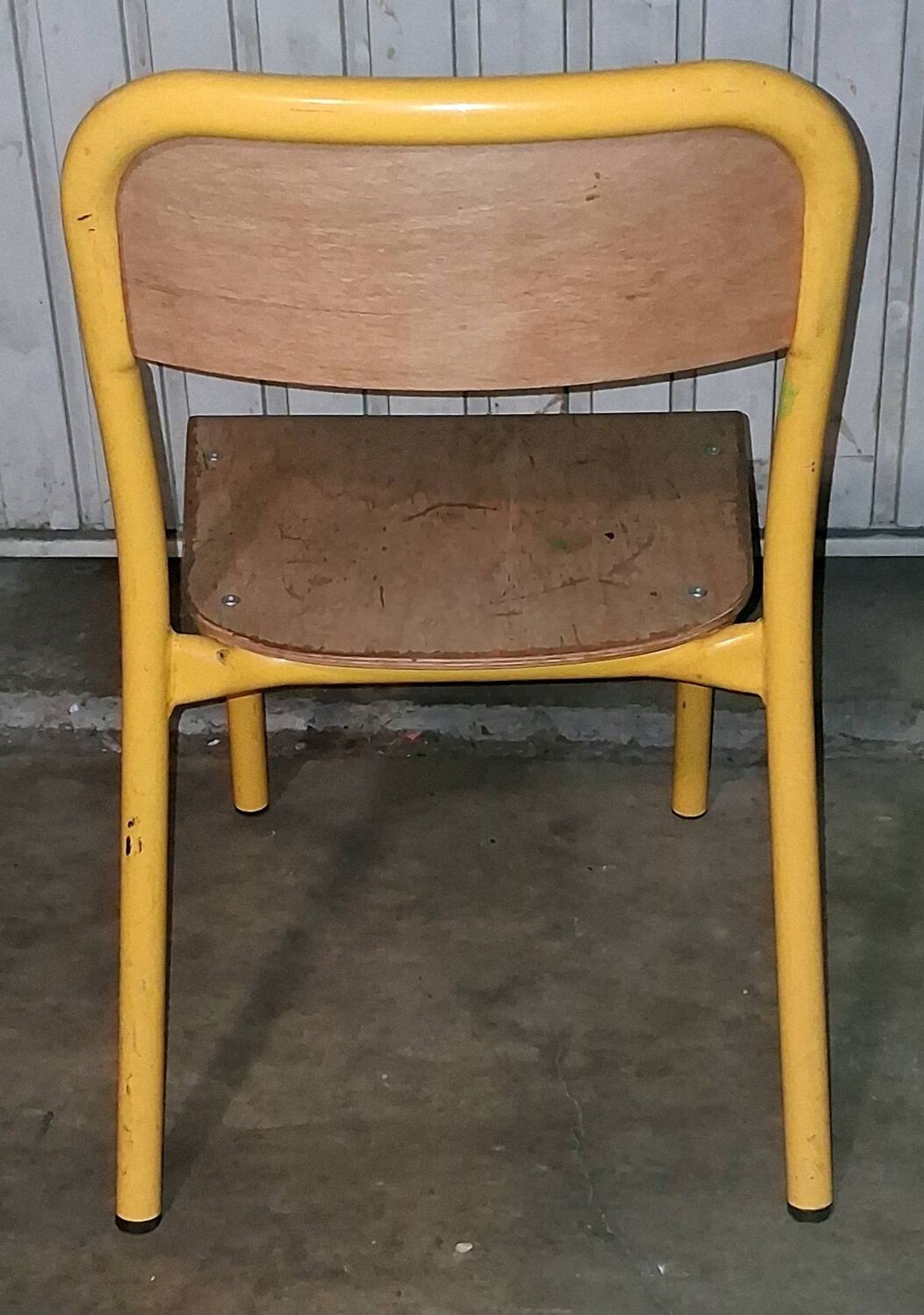 Pair of school chairs, wood and yellow metal, industrial decor.