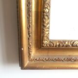 Wooden frame and gilded stucco
