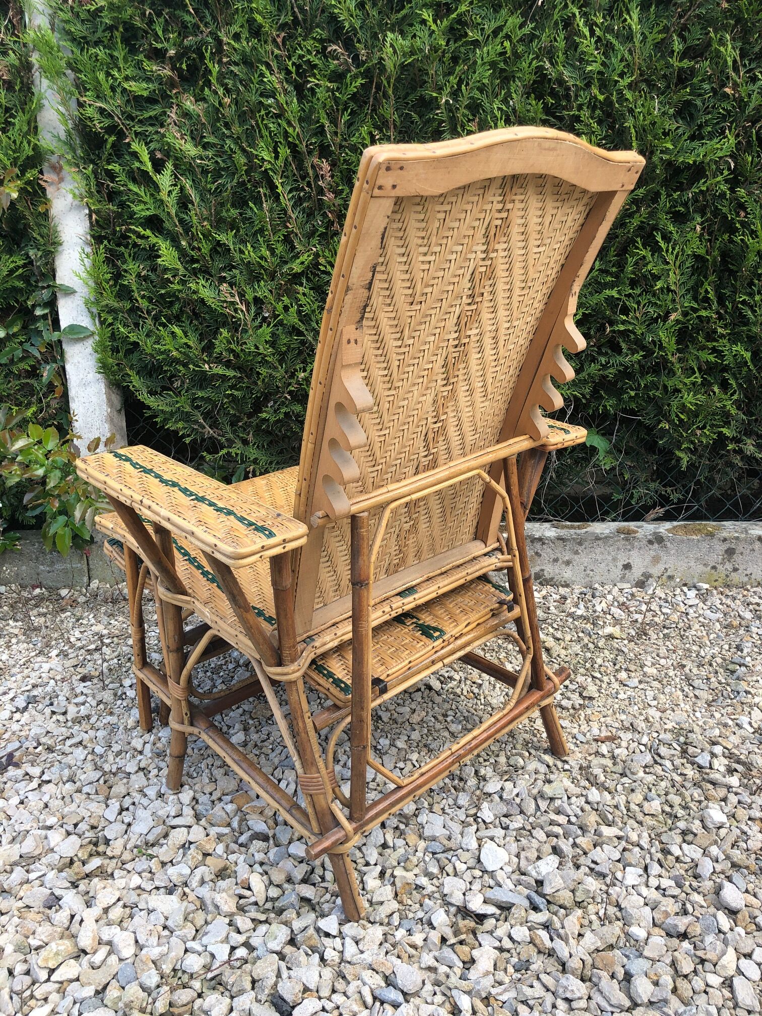 Rattan lounger with foot rest