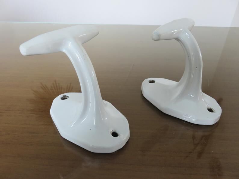 Pair of white cast iron patères art deco 30 40