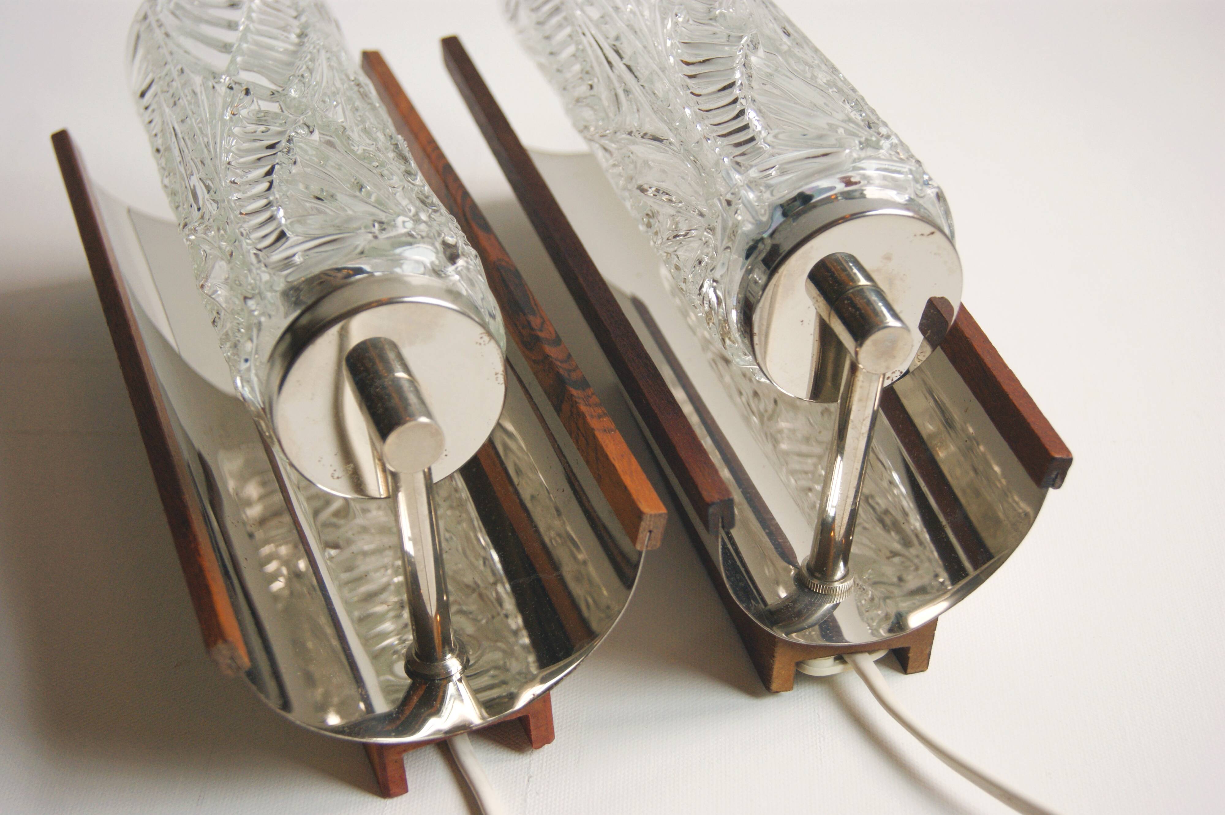 Pair of Swedish vintage wall lamps - elegant design in crystal glass, teak and chrome - 1960s.