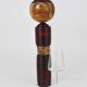 Decorative Kokeshi doll sculpture from northern Japan, hand-painted, signed.