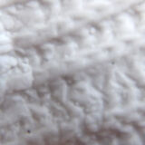 Ceramic vase cotton cladding