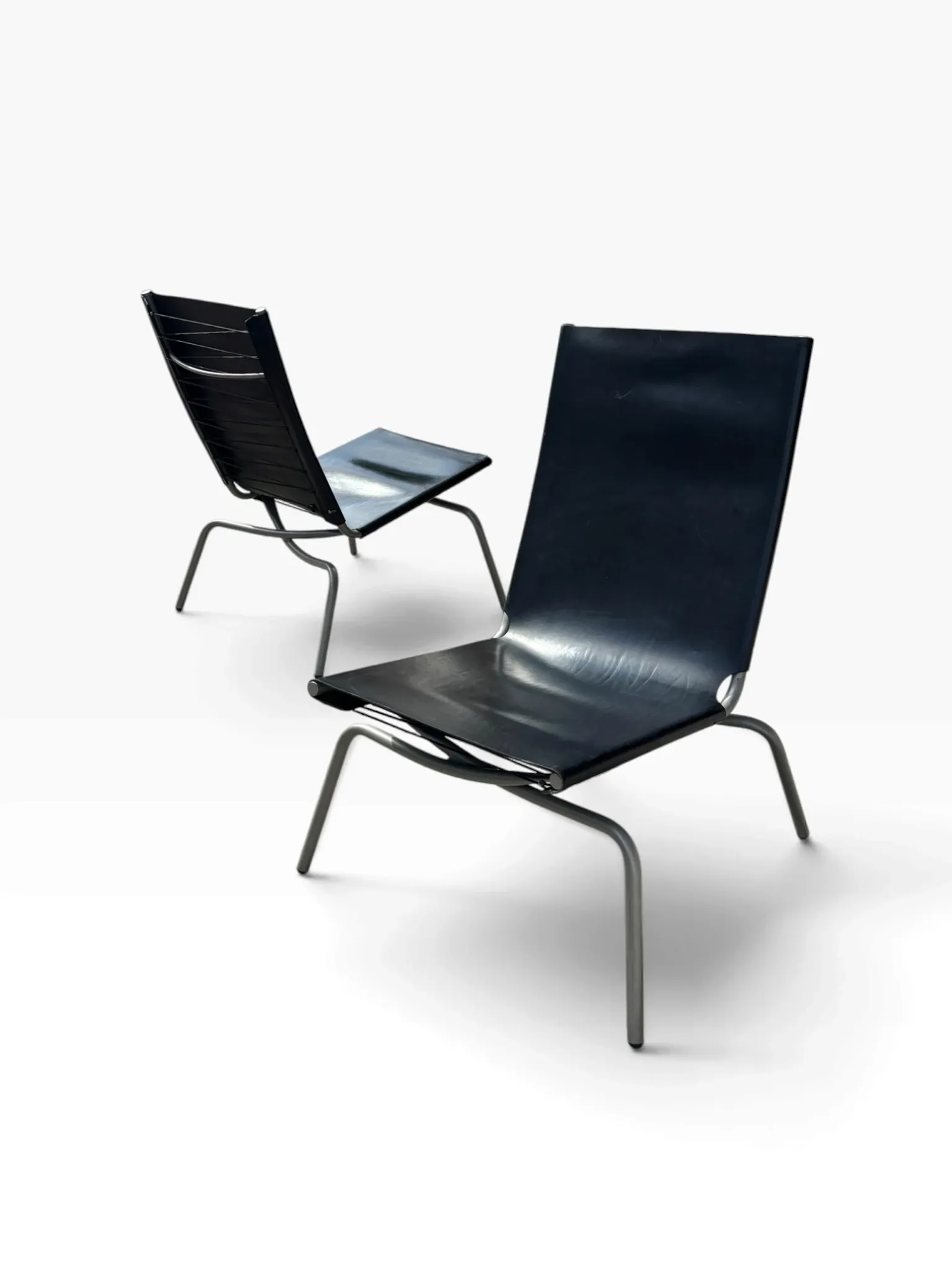 Set of 2 Crossed Legged lounge chairs by Fabiaan van Severen.
