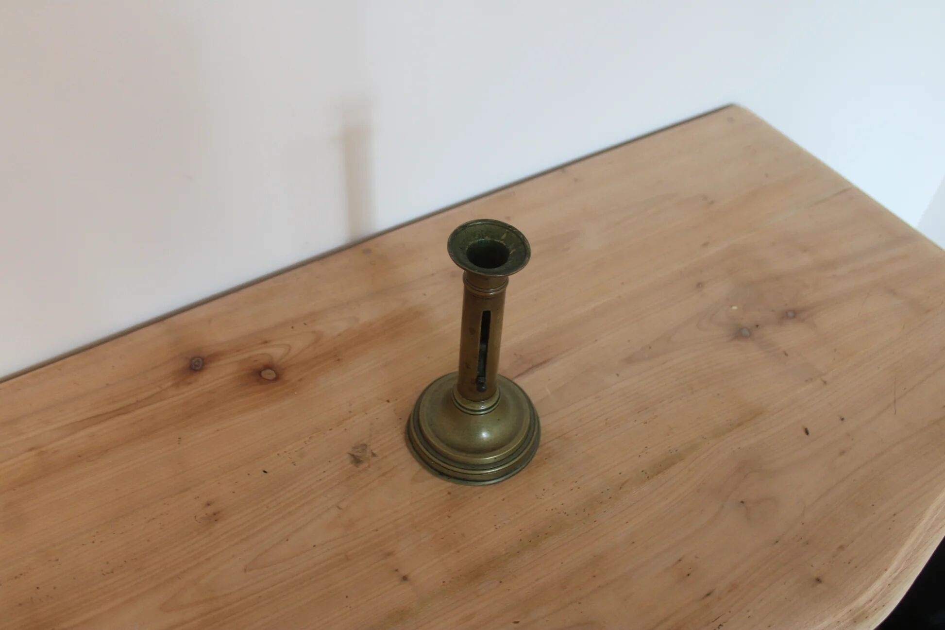 Antique brass push candle holder – vintage patinated candlestick H20 cm