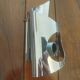 Vintage futuristic wall lamp in chrome sheet metal, space age 70s 80s.