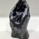Vase with intertwined hands