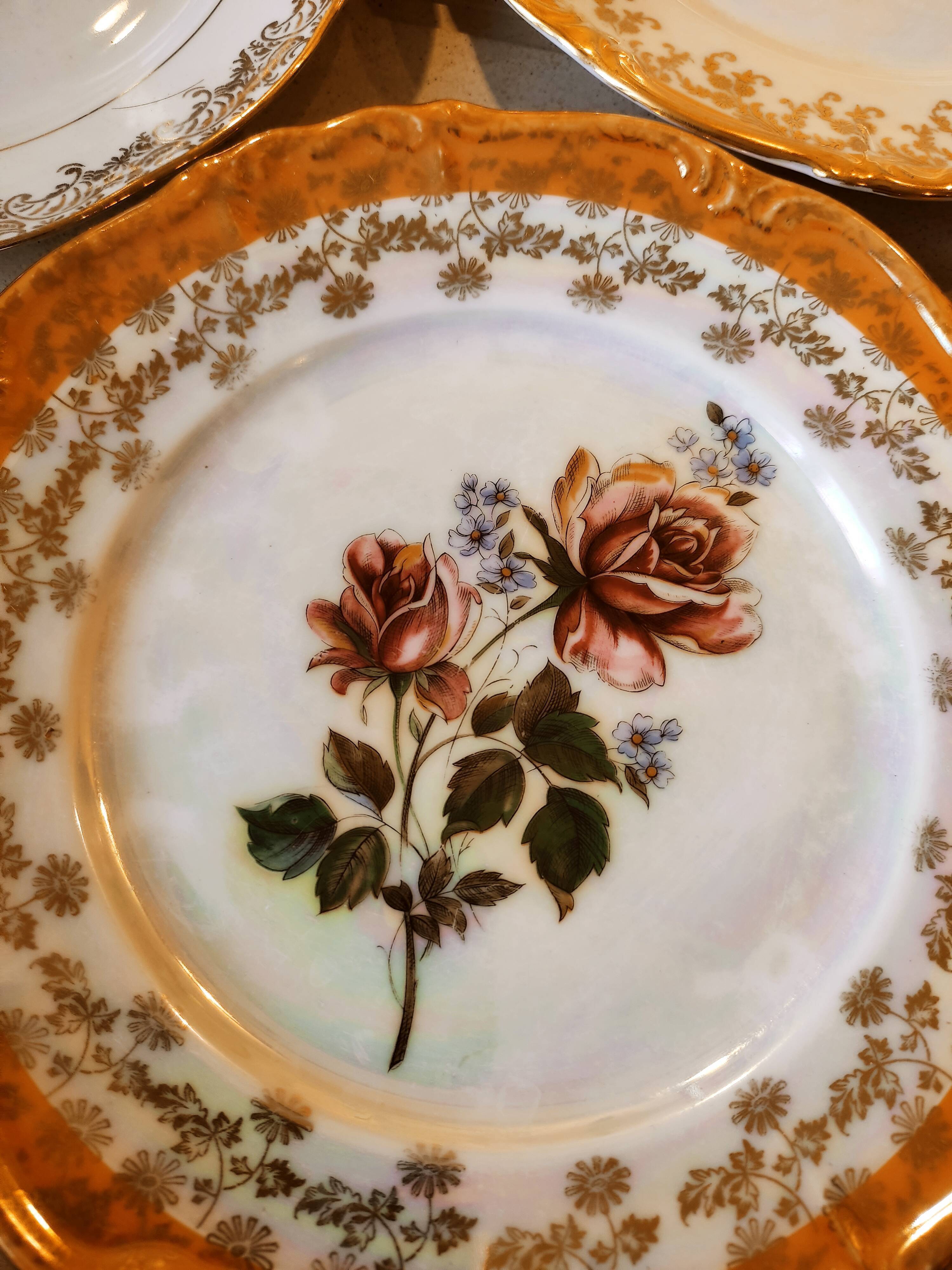 6 mismatched dessert plates decorated with roses