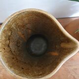 High pitcher in sandstone