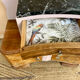 Art Deco bedside table in powder pink painted wood.
