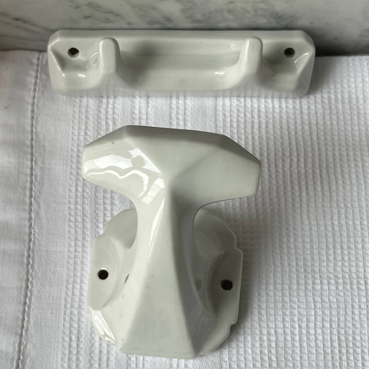 White porcelain coat hooks