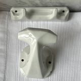 White porcelain coat hooks
