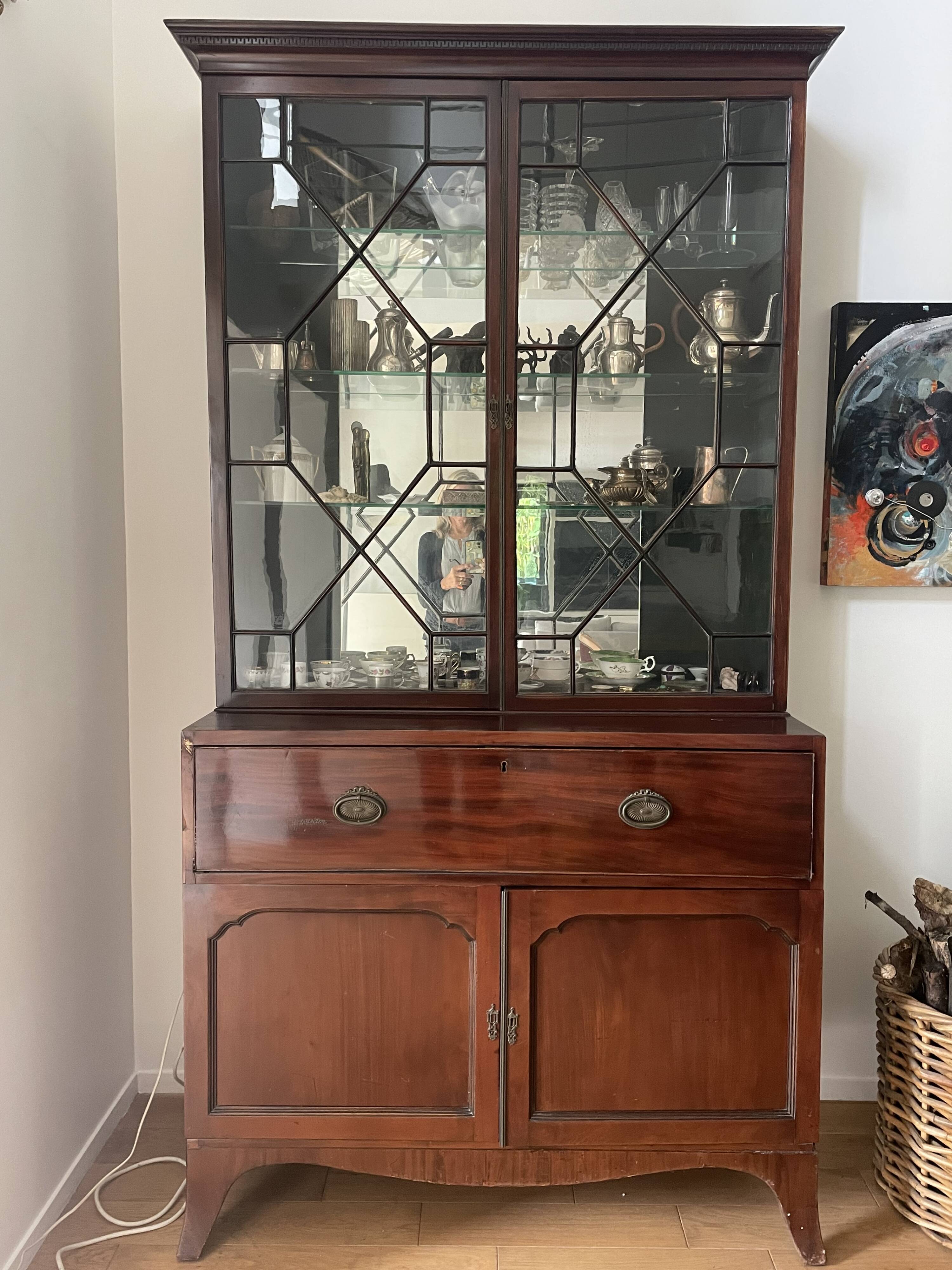 Library with English mahogany secretary.
