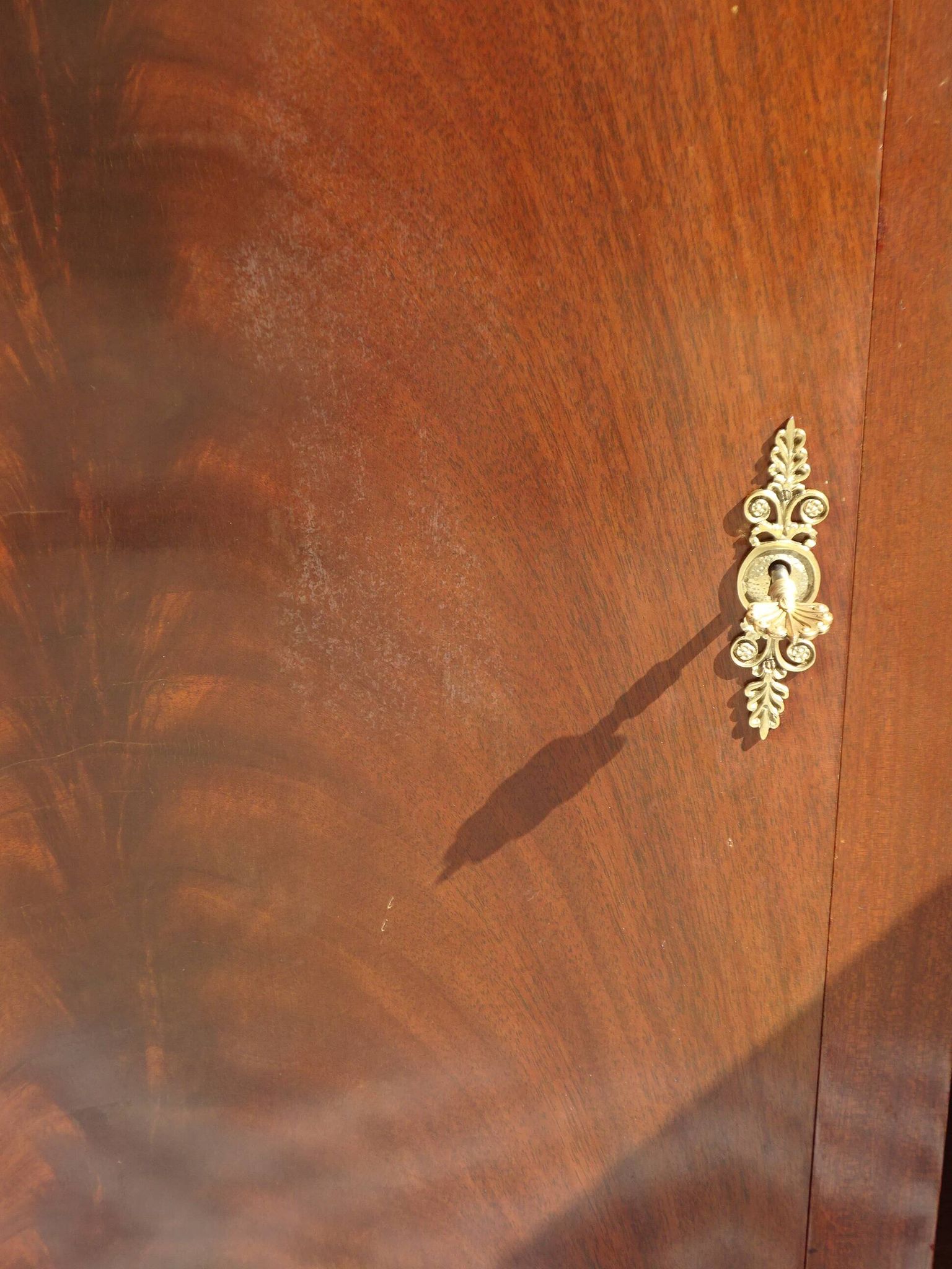 Flamed mahogany enfilade with sea green marble in Empire style.