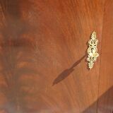 Flamed mahogany enfilade with sea green marble in Empire style.