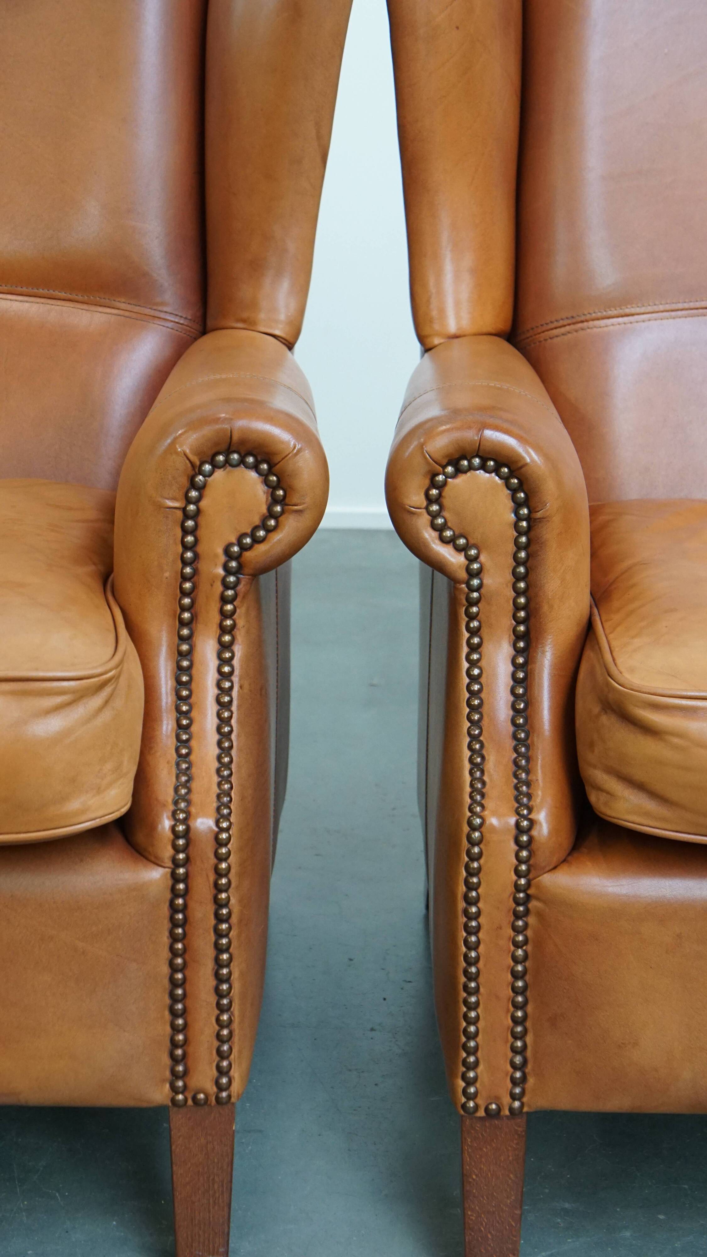 Set of 2 leather wingback chairs