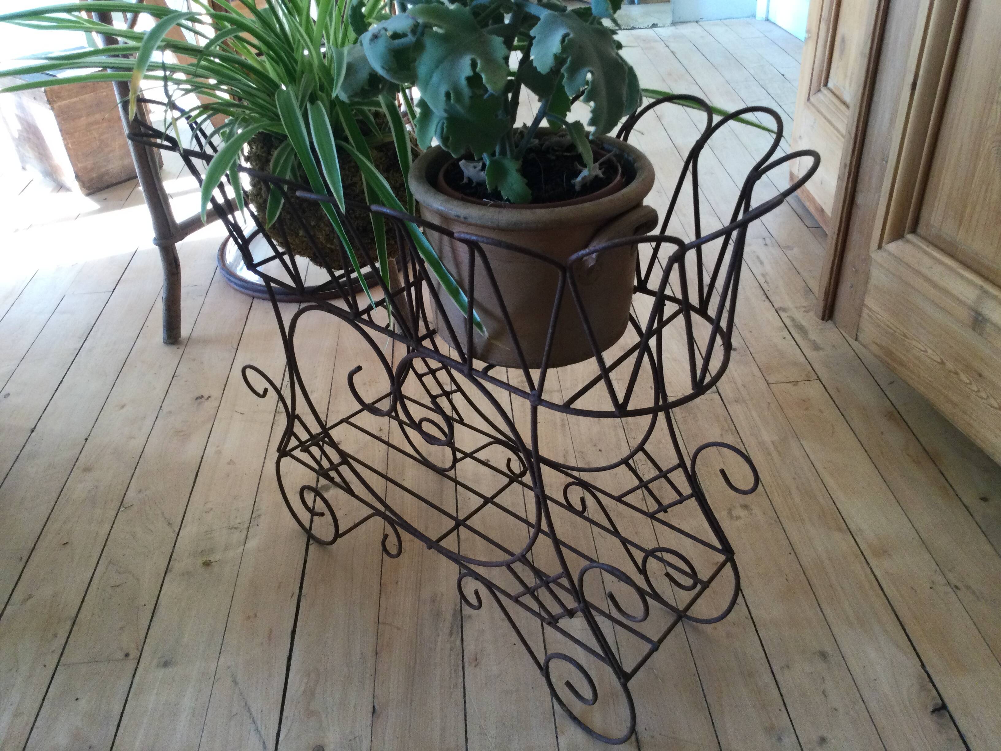 Antique iron plant stand