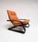 Refurbished cognac leather armchair, 1960s.