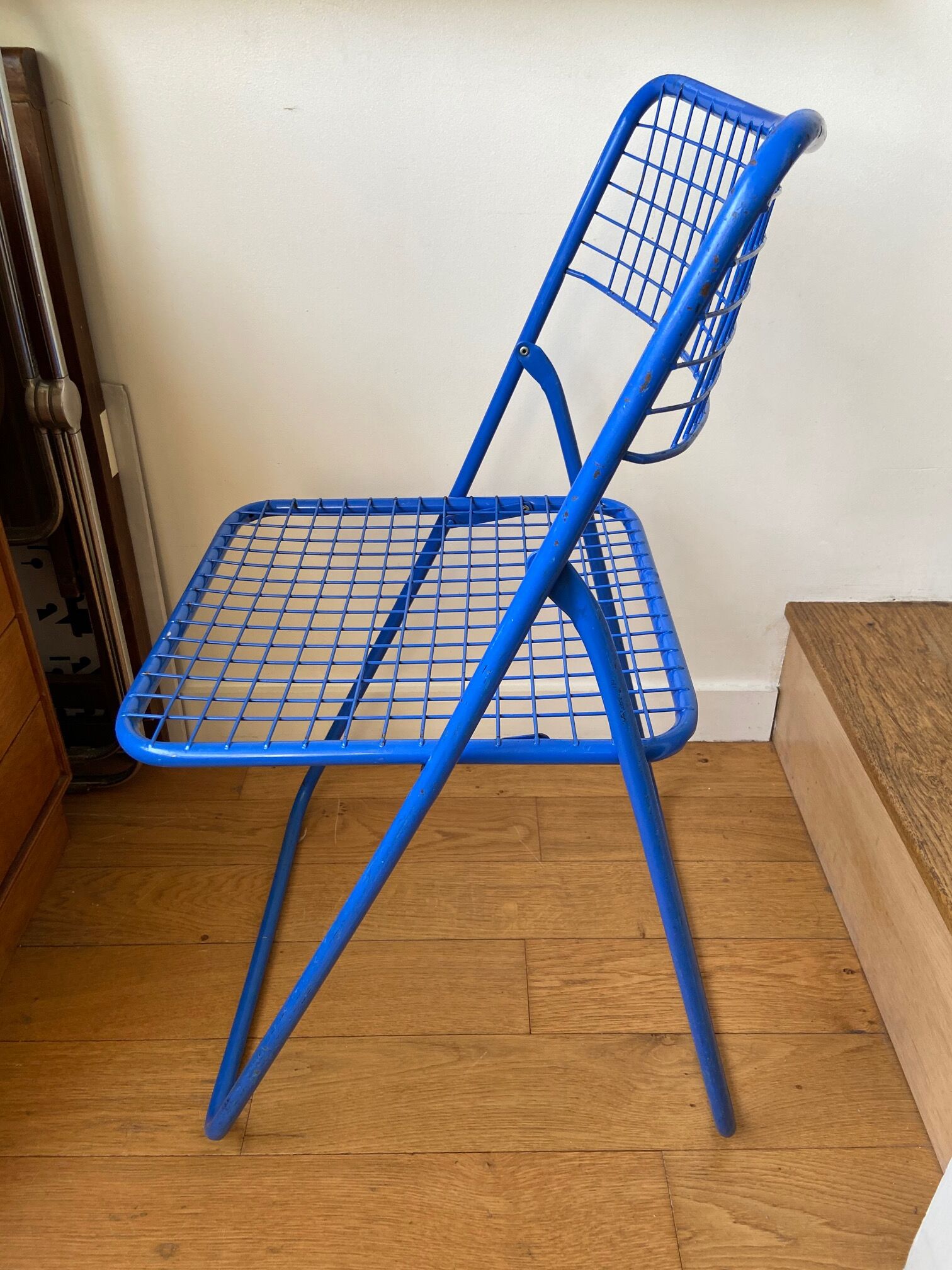 Blue "Ted Ned" folding chair by Niels Gammelgaard