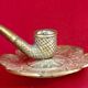 antique hand candlestick known as a rat of the cellar in bronze art Pipe