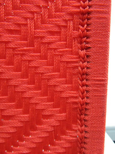 Fauteuil tissé en nylon rouge