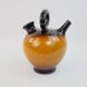 Ochre-orange ceramic jug signed under the base CP Claude Paci