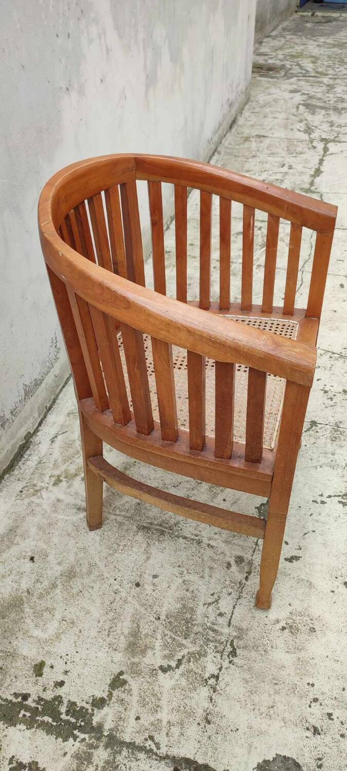 Old vintage teak wood cane armchair