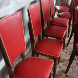 Lot of 8 vintage wooden chairs and red skai