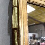 Miroir en bois doré, style Louis XVl, début XXe