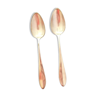 Two silver-plated metal spoons from the late 19th century