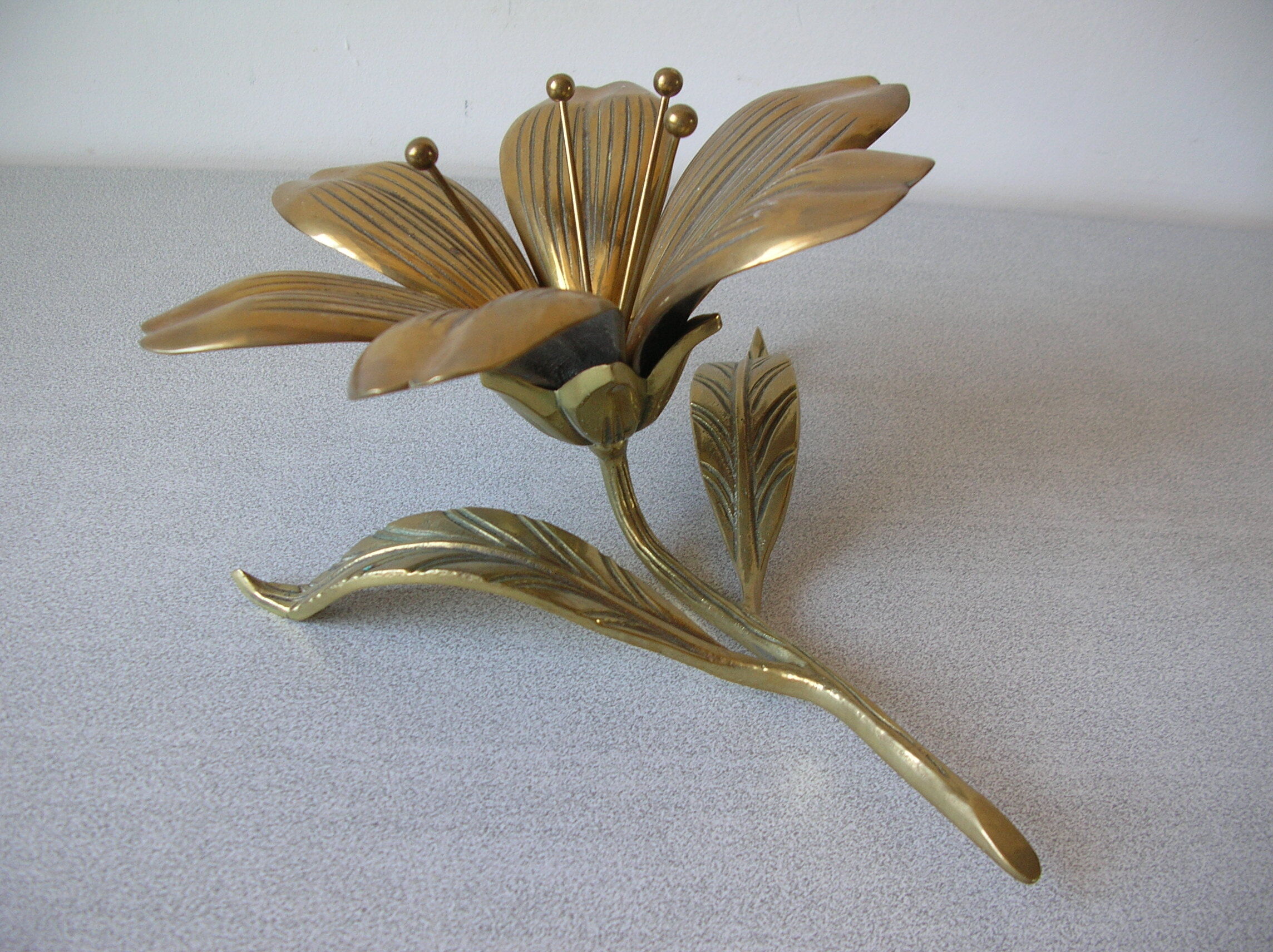 Ancient bronze flower 6 petals in ashtray