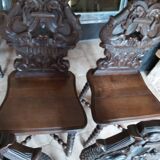 4 stylized dolphin back chairs