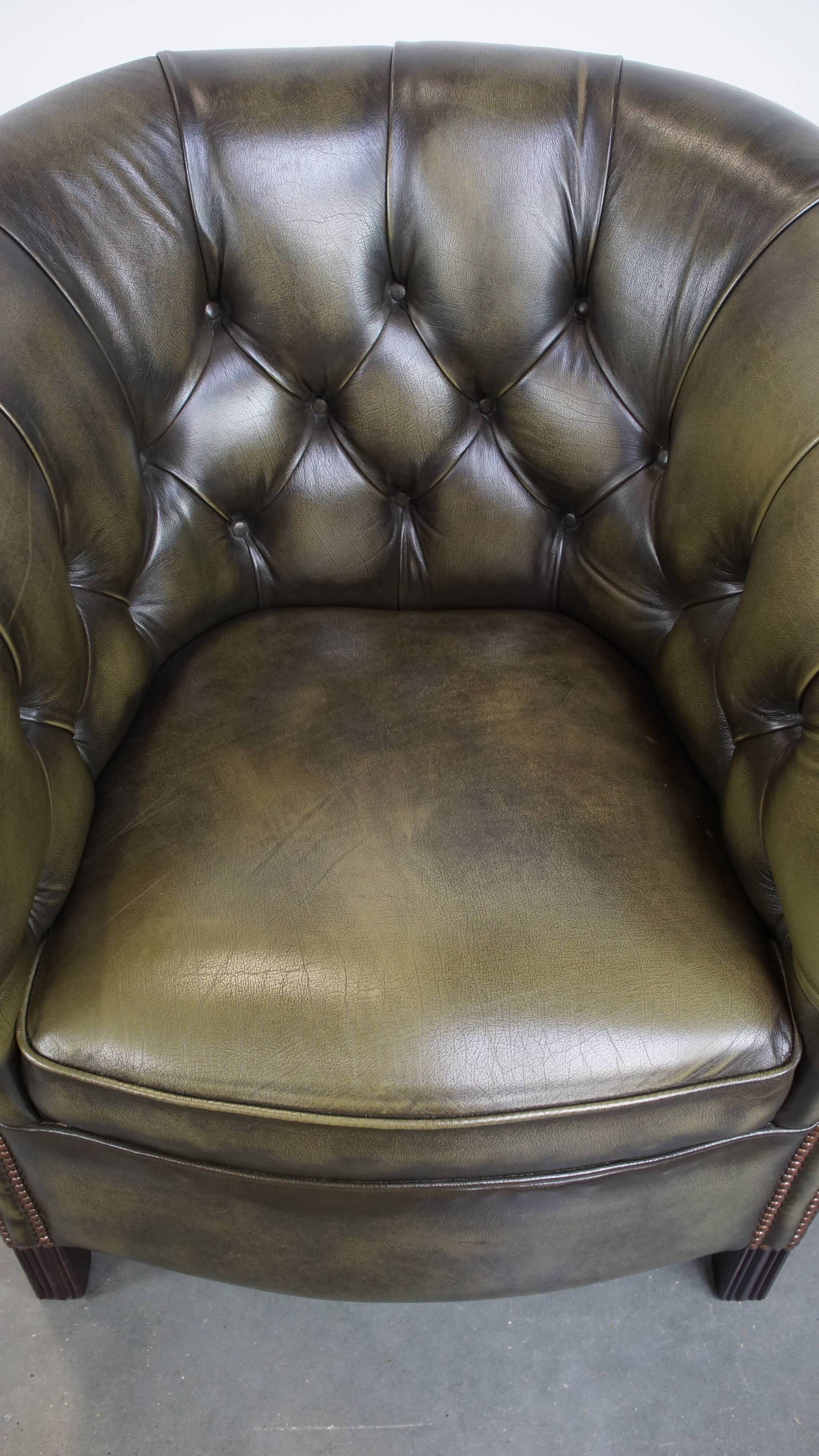 English Chesterfield club chair in olive green cowhide leather